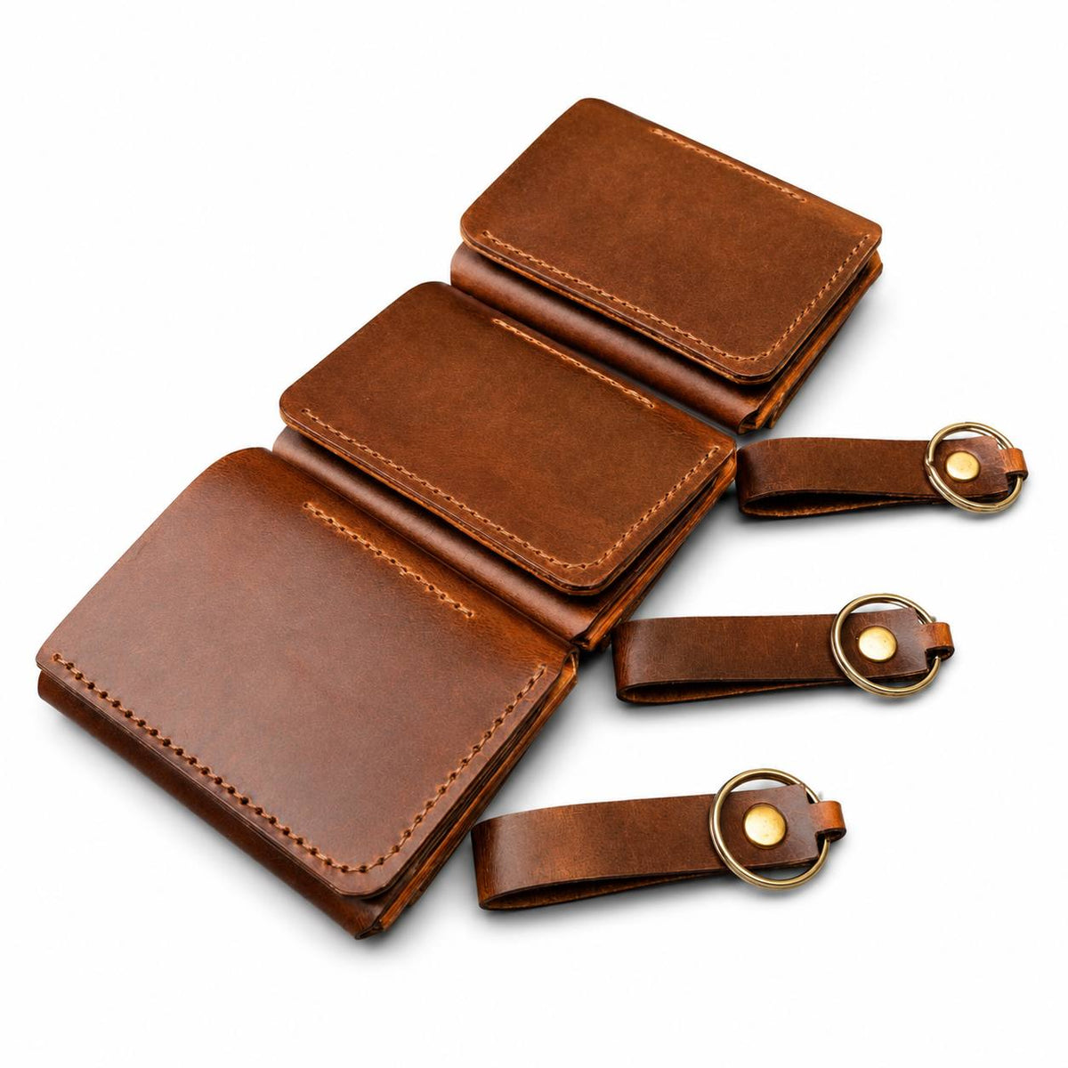 estaw 3 portfeli skórzanych z dopasowanymi brelokami